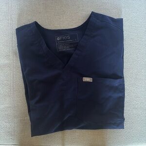 Figs scrub top! One pocket as shown size small. Navy.